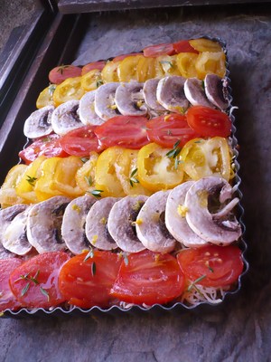 Pain de viande aux carottes, tomates et champignons