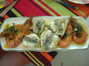 Joues de lotte et gambas au beurre ail et persil